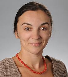 Dr. Kinga Varga-Dobai smiling at camera