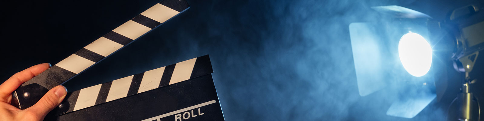 Cinema items: clapboard and lighting
