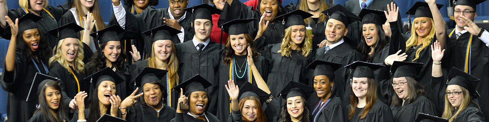 Group of cheerful GGC graduates