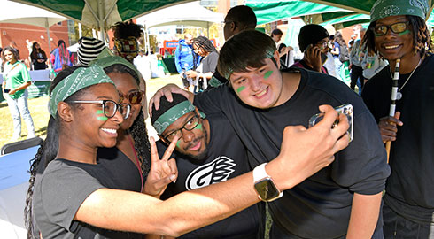 Students taking a selfie at Grizzlyfest