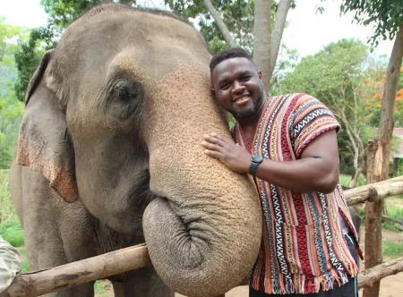 Dr. Neville Forlemu visits an elephant sanctuary in Thailand.
