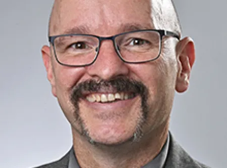 Dr. Justin E. Jernigan