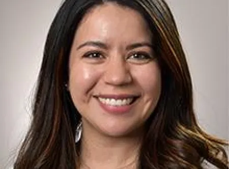 Diana Gonzalez smiling at the camera