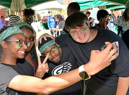 Students taking a selfie at Grizzlyfest