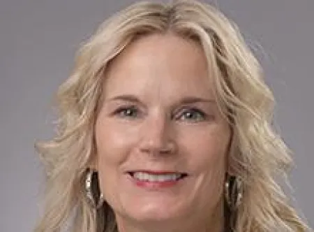 Dana K. Johnson smiling at the camera