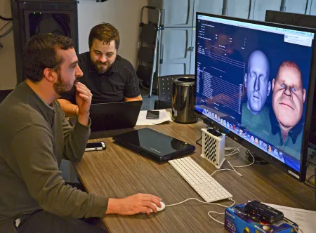 Information technology students designing animation