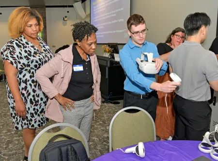Georgia K-12 educators Lakecia Gray, Susan Daughtry and Sean Nolan, GGC information technology major, software development concentration, participate in TAP activities.