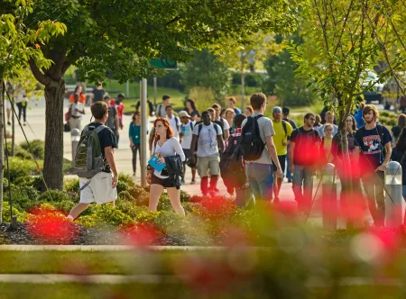 Busy GGC campus with students walking between classes.