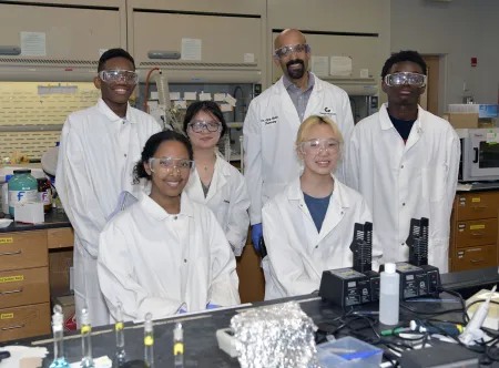 Back row: Malchi McClain and Michelle Die and Dr. Ajay Mallia, front row: Galioee Degracig and Joyce Lee.jpg