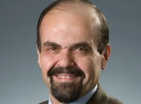 Dr. Kamal Kakish smiling at camera