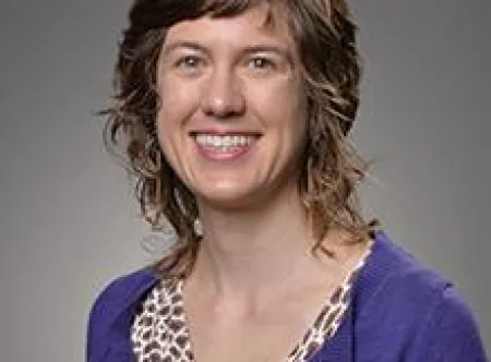 Catherine A. Moore smiling at camera