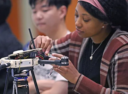 Student working on drone