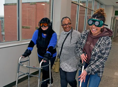 human services majors participating in aided walking demo