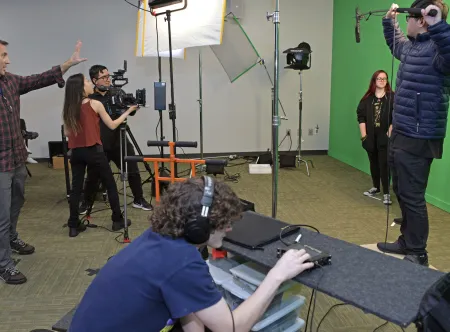 Film students setting up a scene