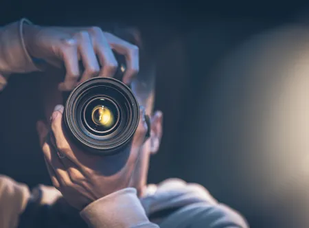 Man taking a picture with camera 