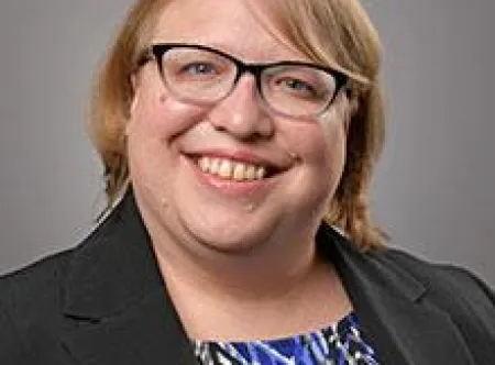 Dr. Kara Latopolski headshot smiling at camera