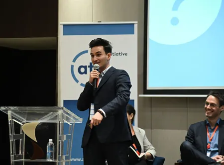 Flurim Aliu, ’17, shares his expertise during the Addis Tax Initiative event.