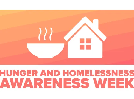 Image of hunger and homelessness week written in white letters on peach-colored background