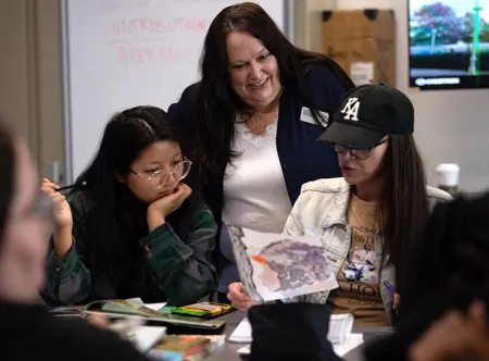 Kristina Jackson discusses the artwork she created with Jen Twe and Dr. Jamie Caudill during the recent Concepts and Best Practices for Teaching Writing with Practicum class