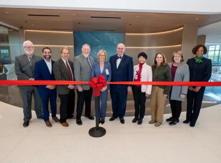 A group of 10 people, including GGC President Jann L. Joseph and members from the Gwinnett Hospital Authority cut a red ribbon on the new Northside Hospital Tower