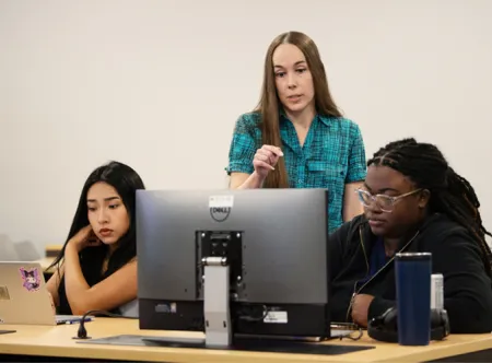 A professor talking to a student