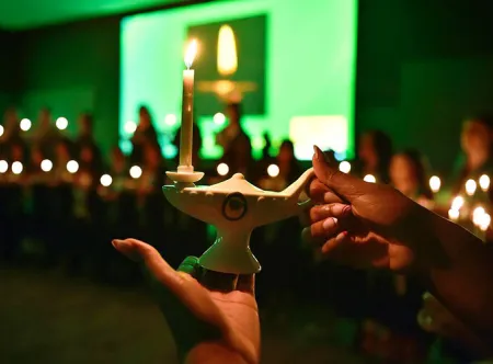 Glowing ceremonial lantern during nursing pinning ceremony