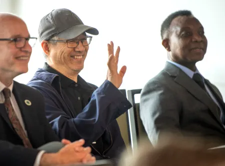 deans and faculty sitting in chairs during the 2026 Scholarship and Creativity Celebration