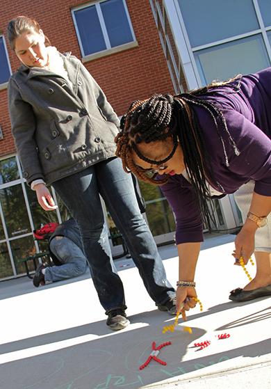 Student demonstrating science outside