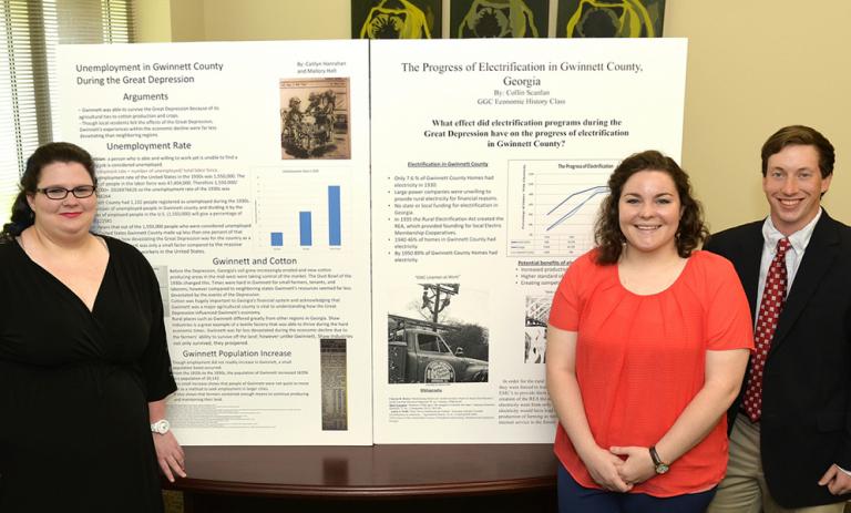 History students posed with academic poster