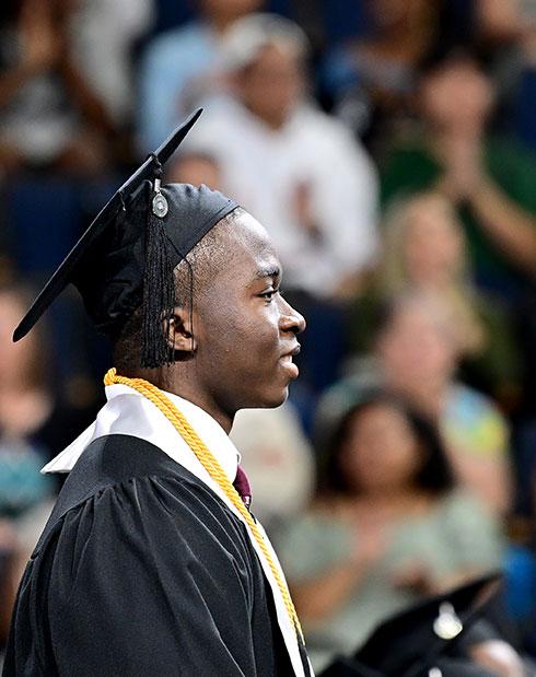 Profile of male graduate at commencement