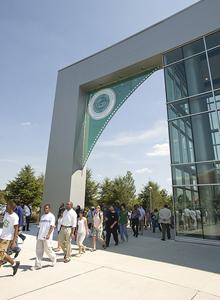 Photo of new students participating in March through the Arch