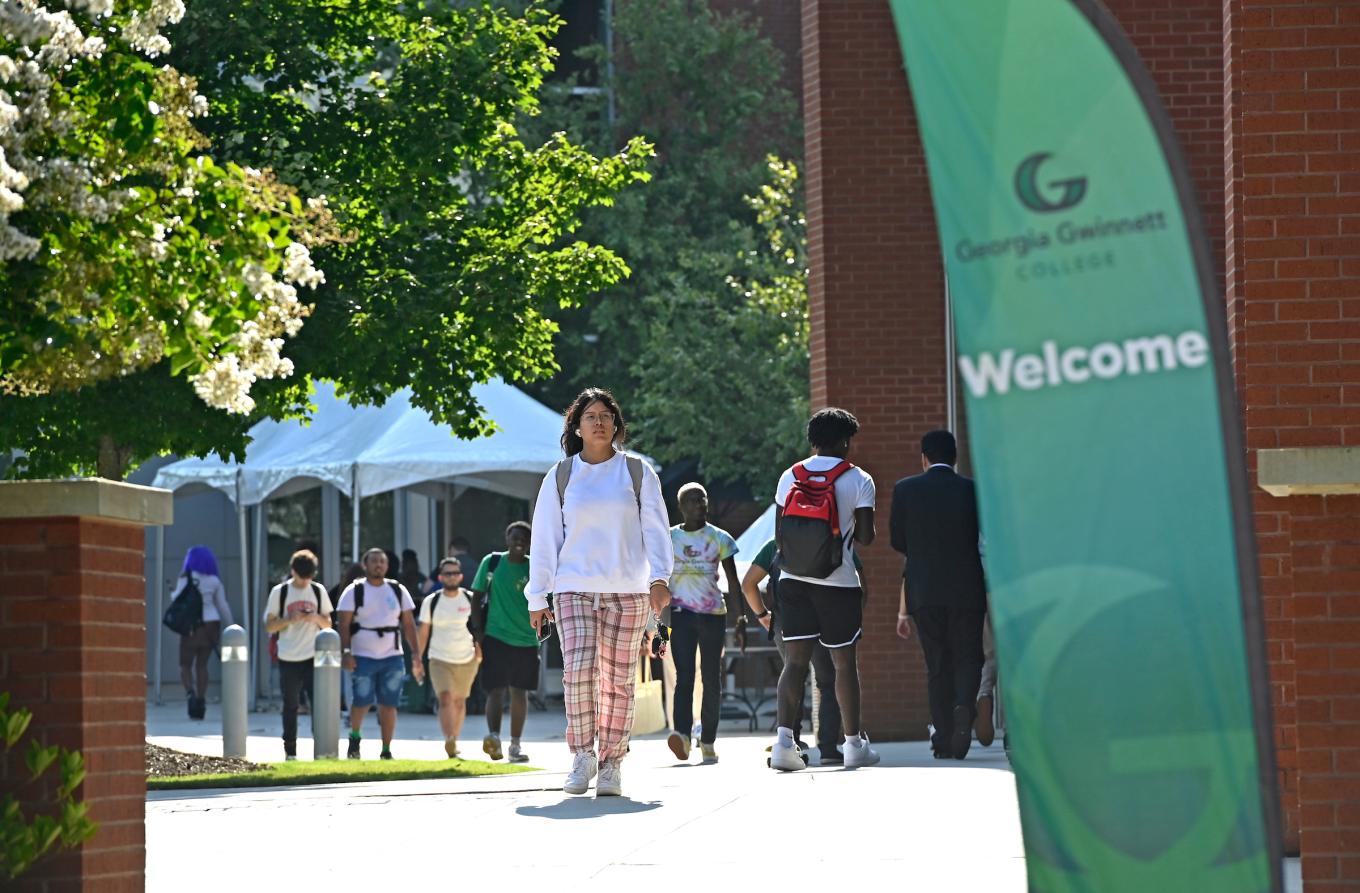 Photo of students walking on campus