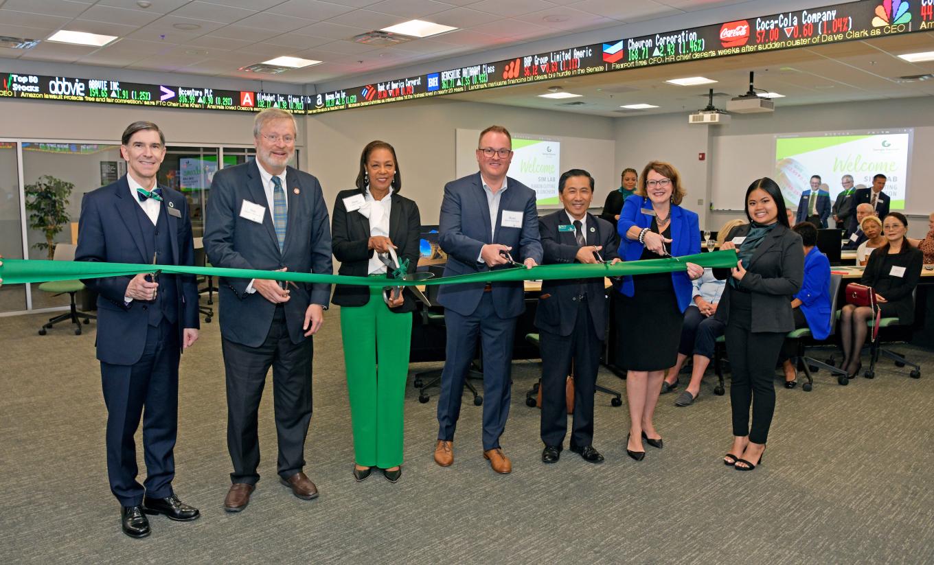 Ribbon Cutting group shot:  (From l. to r.) Dr. George Low, Senator Don Balfour, Dr. Jann L Joseph, Ryan Hawk, Dr. Tyler Yu, Jennifer Hendrickson, Lisa Huynh