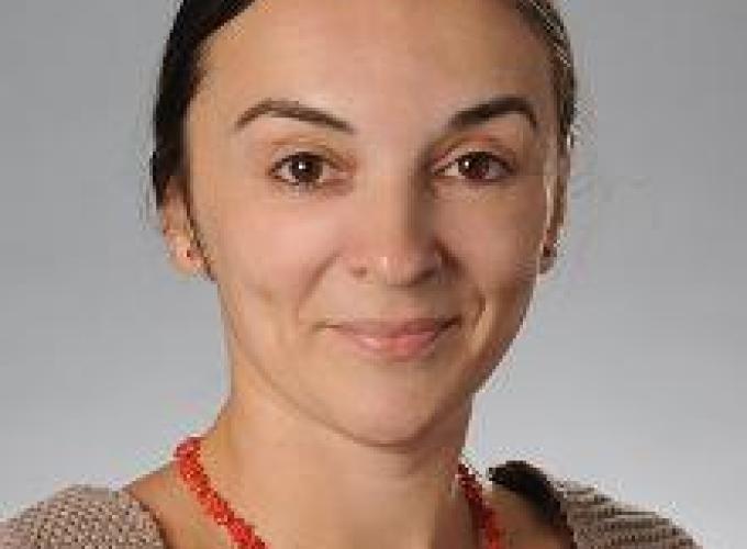 Dr. Kinga Varga-Dobai smiling at camera