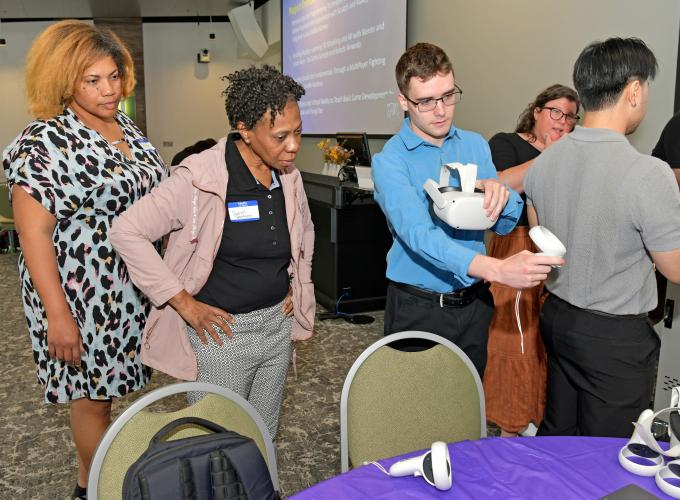 Georgia K-12 educators Lakecia Gray, Susan Daughtry and Sean Nolan, GGC information technology major, software development concentration, participate in TAP activities.