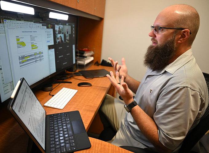 Dr. Ali “AJ” Kooti, assistant professor of accounting, in his office