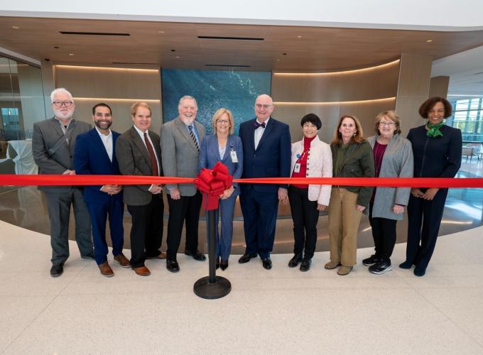 A group of 10 people, including GGC President Jann L. Joseph and members from the Gwinnett Hospital Authority cut a red ribbon on the new Northside Hospital Tower