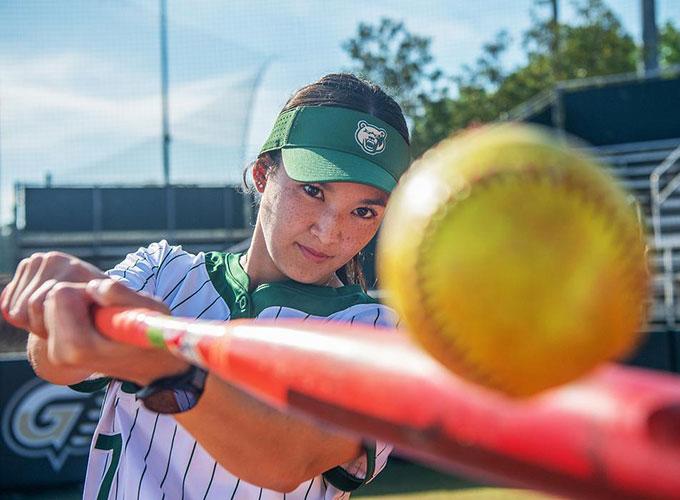 GGC graduate Enna Lackey hitting softball