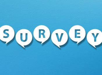 The word Survey written out in bubbles on light blue solid background