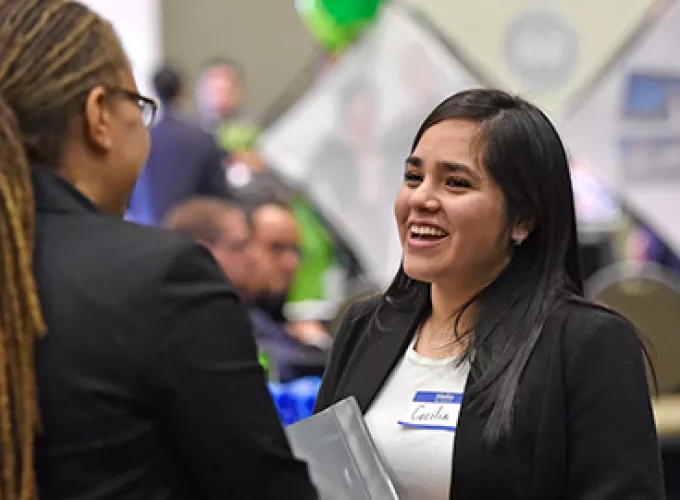 student meeting employer at GGC career fair