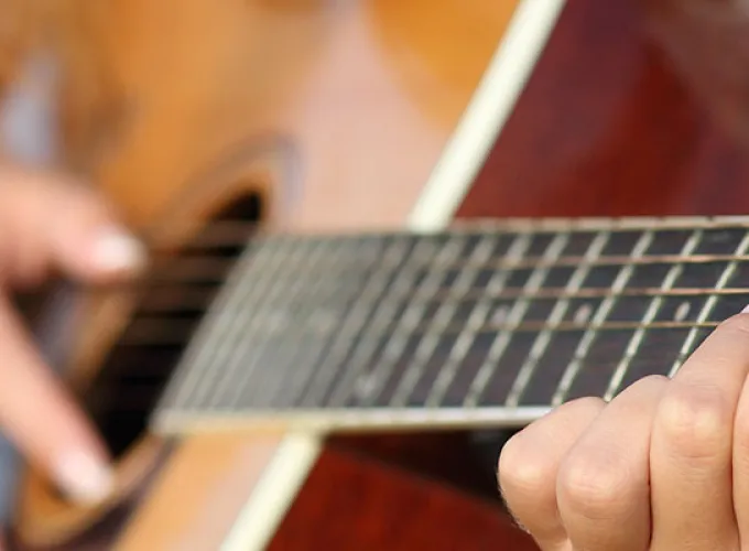 student playing guitar