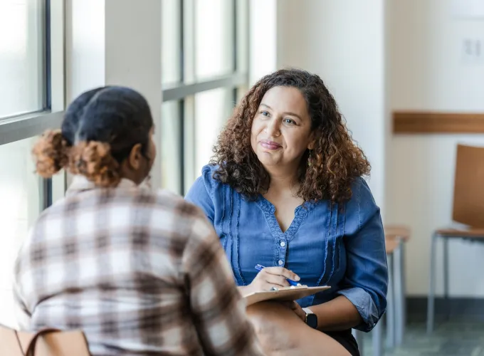 Student speaks to counselor