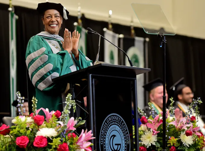 Dr. Jann Joseph smiles during a commencement ceremony