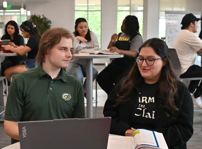 Students sitting at tables