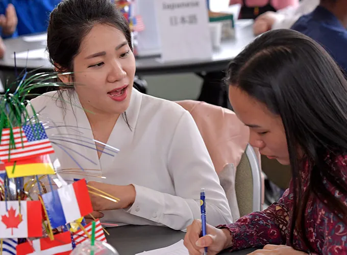 2 people talking during ELI Conversation Partner Program