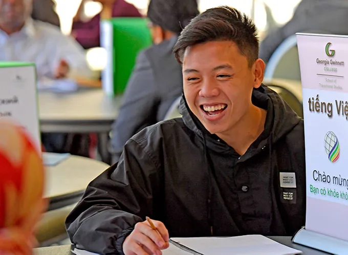student smiling during the Conversation Partner Program