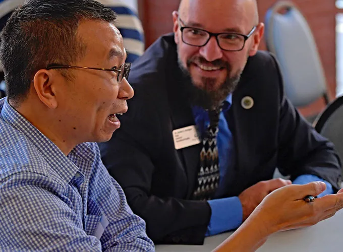 2 people talking during ELI Conversation Partner Program