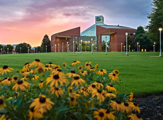 Sunset view of Building B and the Lawn