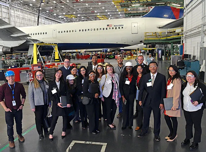 Business majors in the hanger of Delta Airlines