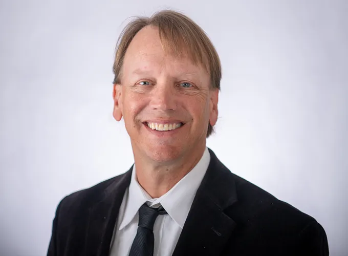 Dr. Todd David Mueller